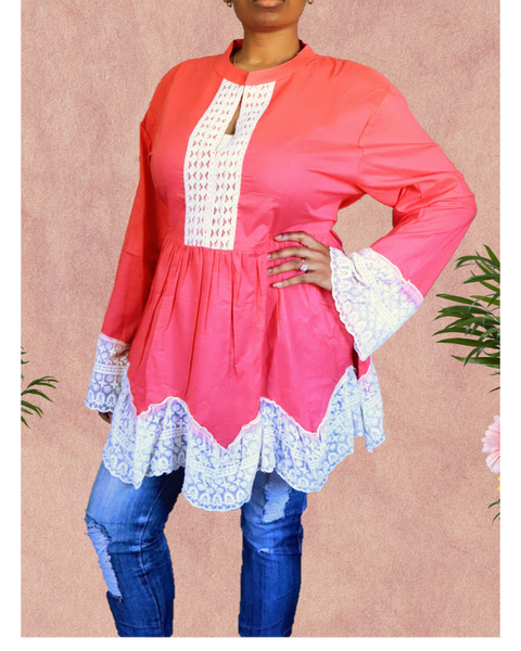 Pink coral baby doll tunic top. Lace detail on arms and bottom trim. Pleated at waist.